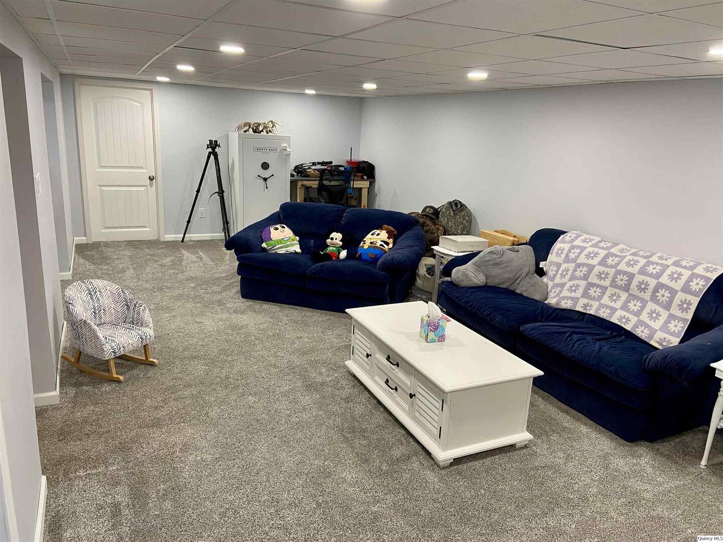 1632 North 24th Street Quincy, IL 62301 - Photo 24 of 36 a living room with furniture and a couch