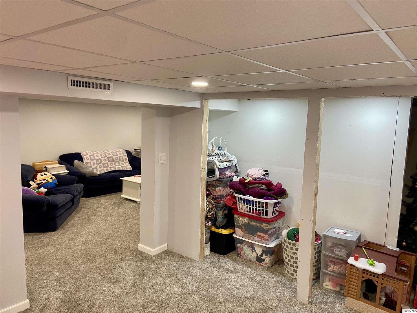 1632 North 24th Street Quincy, IL 62301 - Photo 28 of 36 a view of a livingroom with toys