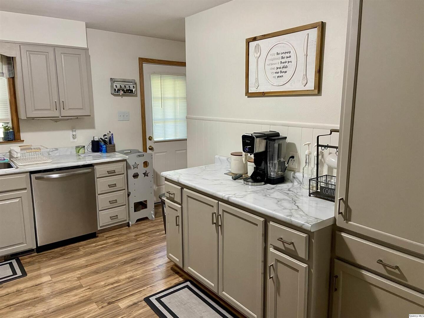 1632 North 24th Street Quincy, IL 62301 - Photo 34 of 36 a kitchen with a sink and cabinets