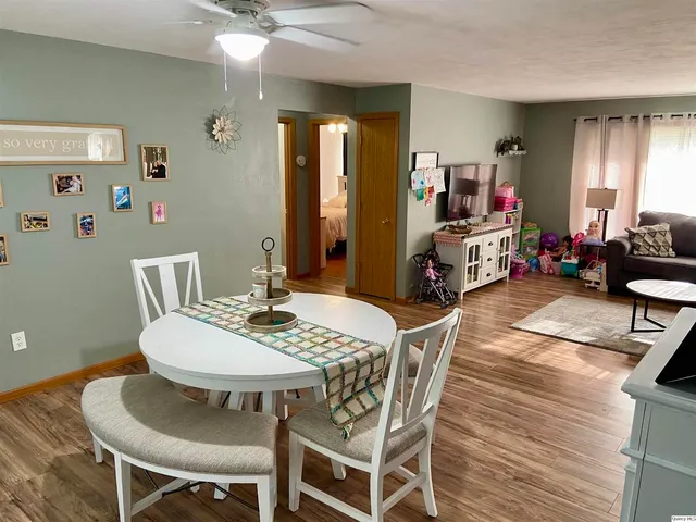 a view of a dining room with furniture