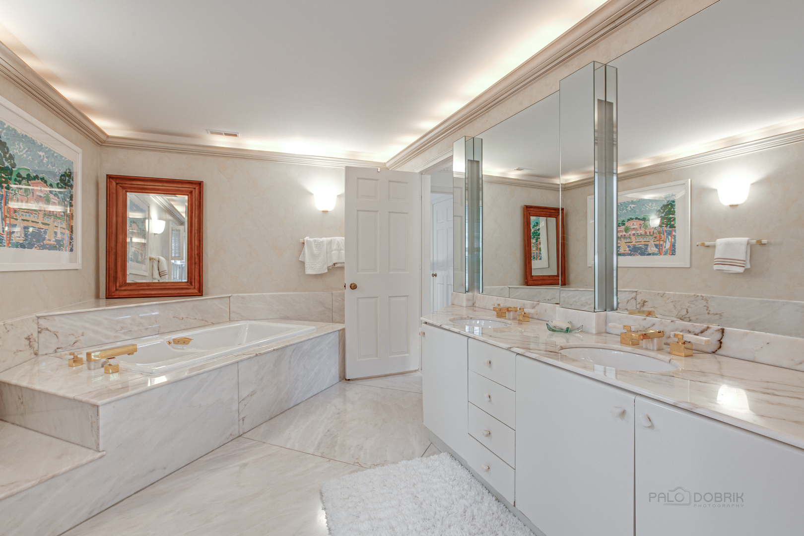 473 Sheridan Road Winnetka, IL 60093 - Photo 18 of 32 a spacious bathroom with a tub sink and mirror