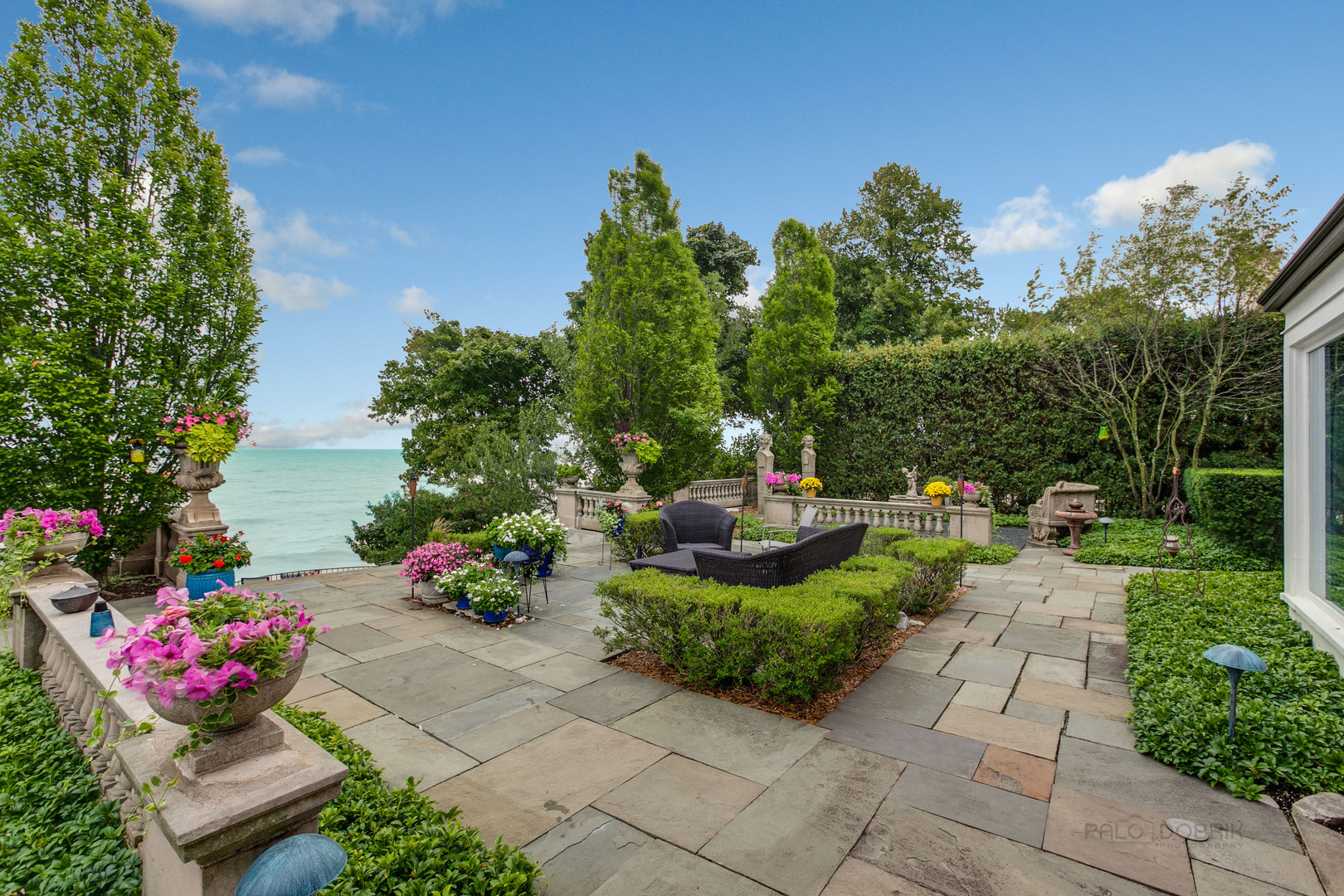 473 Sheridan Road Winnetka, IL 60093 - Photo 28 of 32 a view of a backyard with sitting area