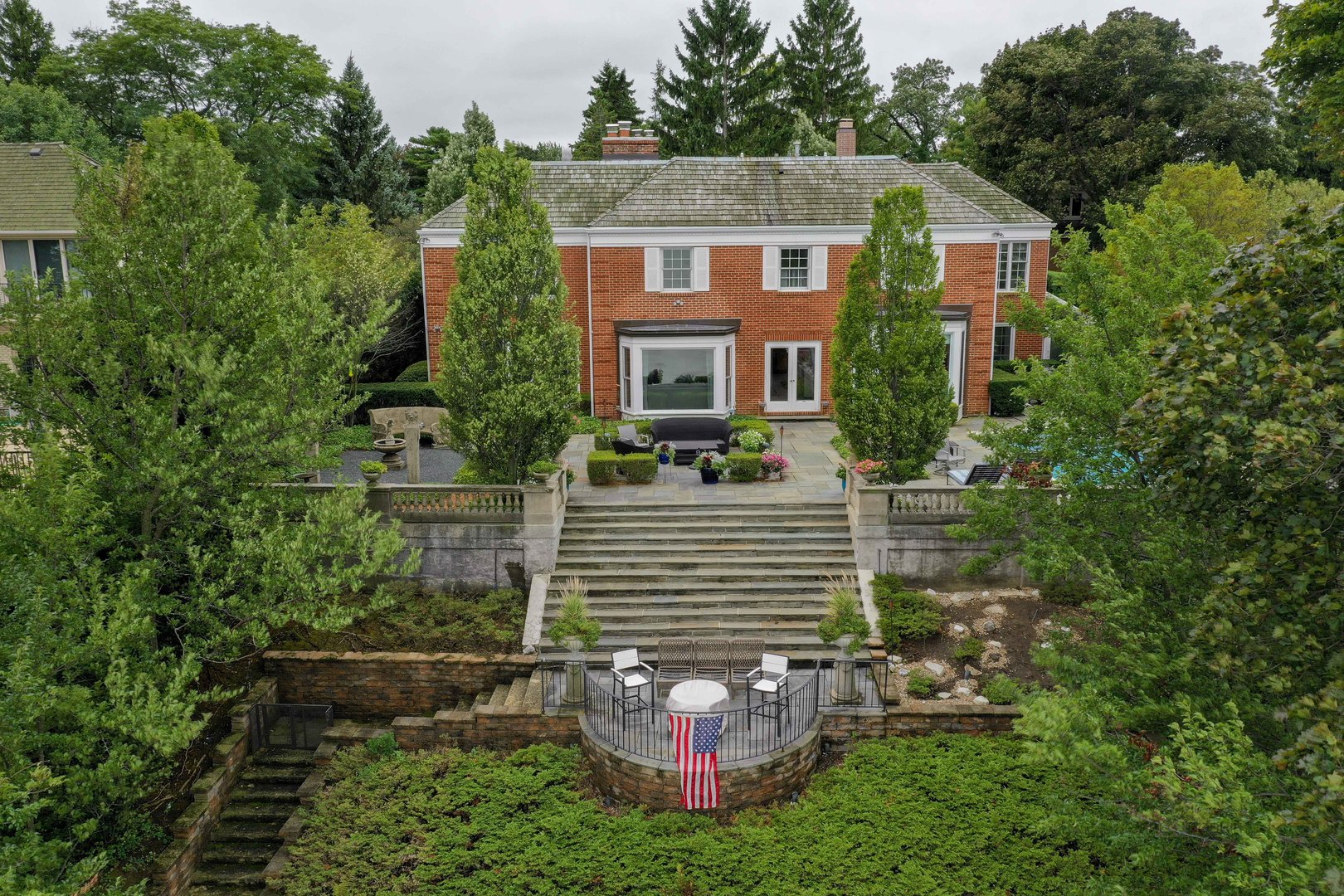 473 Sheridan Road Winnetka, IL 60093 - Photo 30 of 32 a view of house with a yard