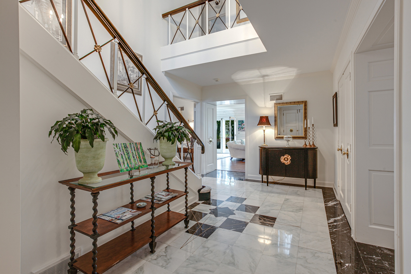 473 Sheridan Road Winnetka, IL 60093 - Photo 4 of 32 a view of entryway with wooden floor and windows