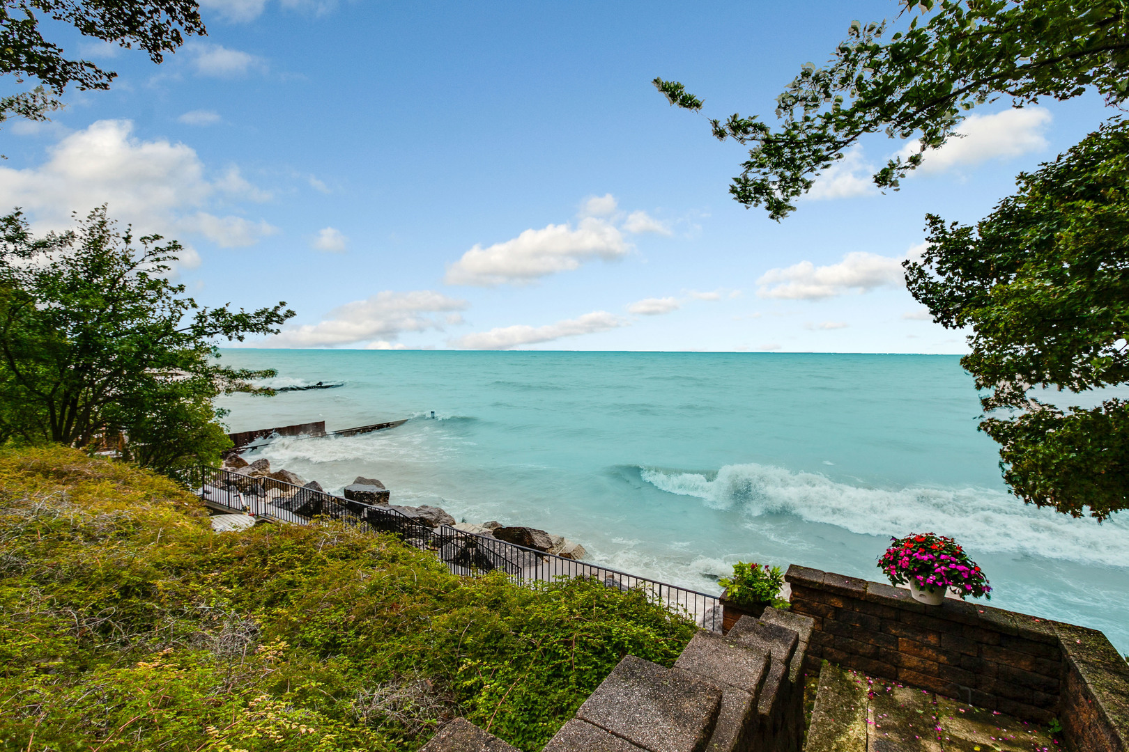 473 Sheridan Road Winnetka, IL 60093 - Photo 32 of 32 a view of a garden with plants and a bench