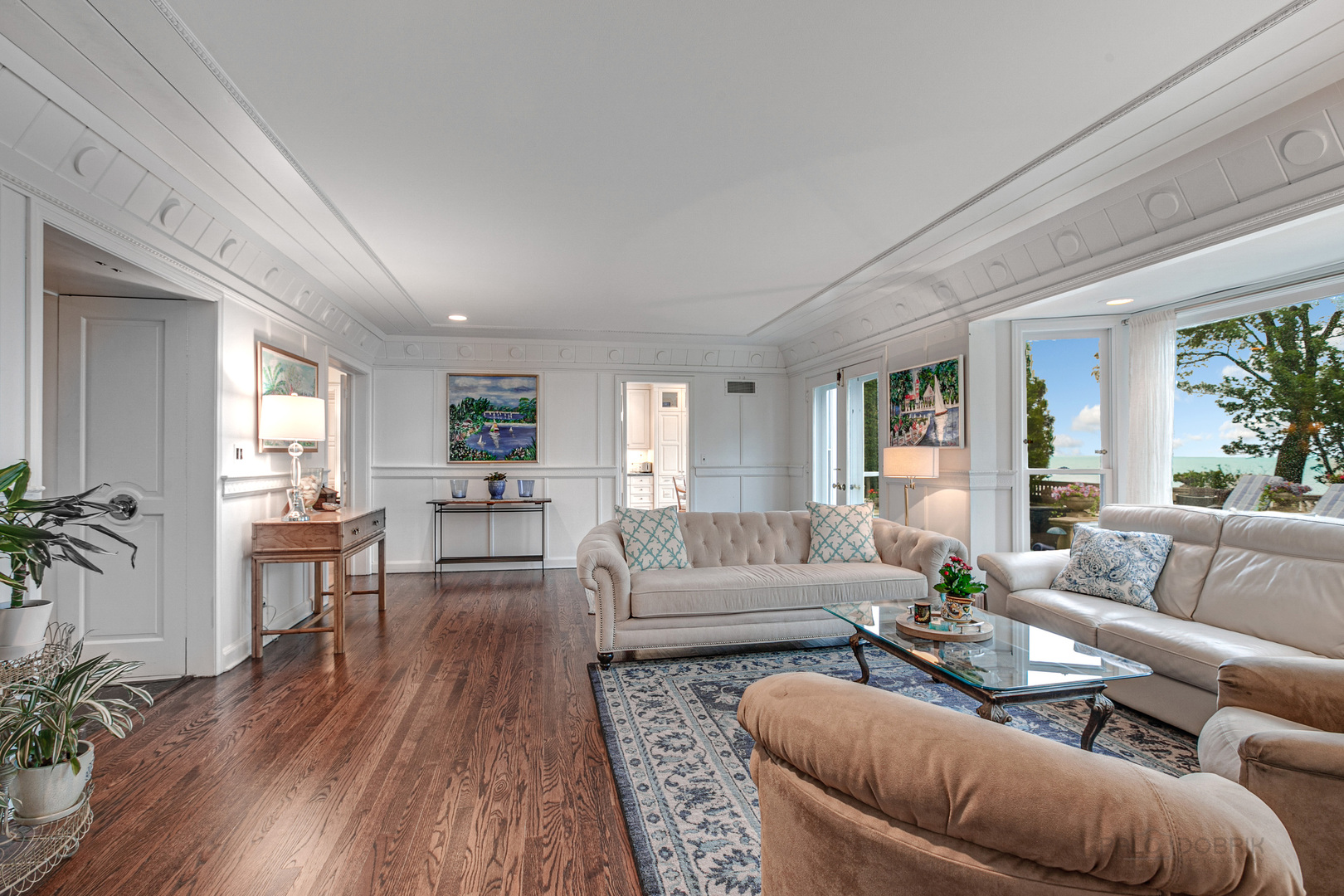 473 Sheridan Road Winnetka, IL 60093 - Photo 9 of 32 a living room with furniture wooden floor and a large window