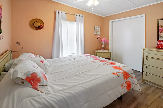 a bedroom with a bed and a closet