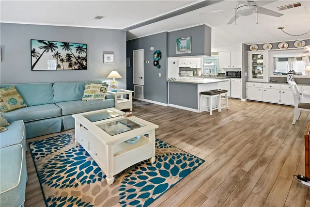 a living room with furniture and a table