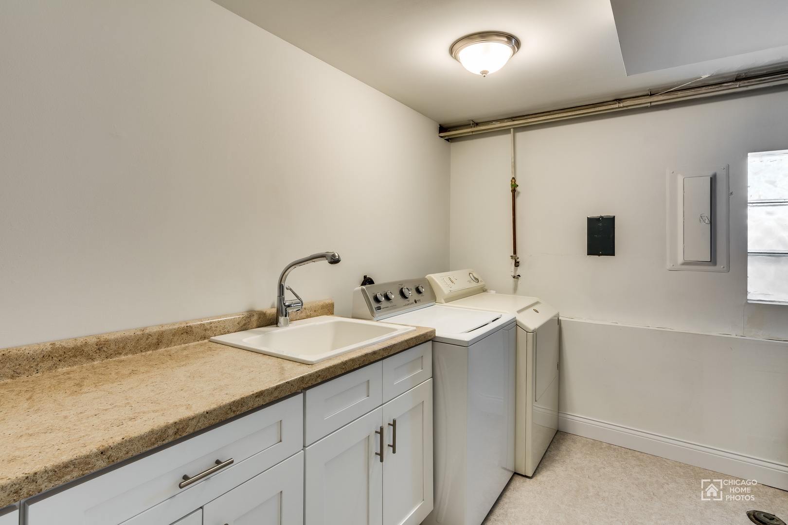 131 Chestnut Road Northbrook, IL 60062 - Photo 21 of 26 a bathroom with a sink and a mirror
