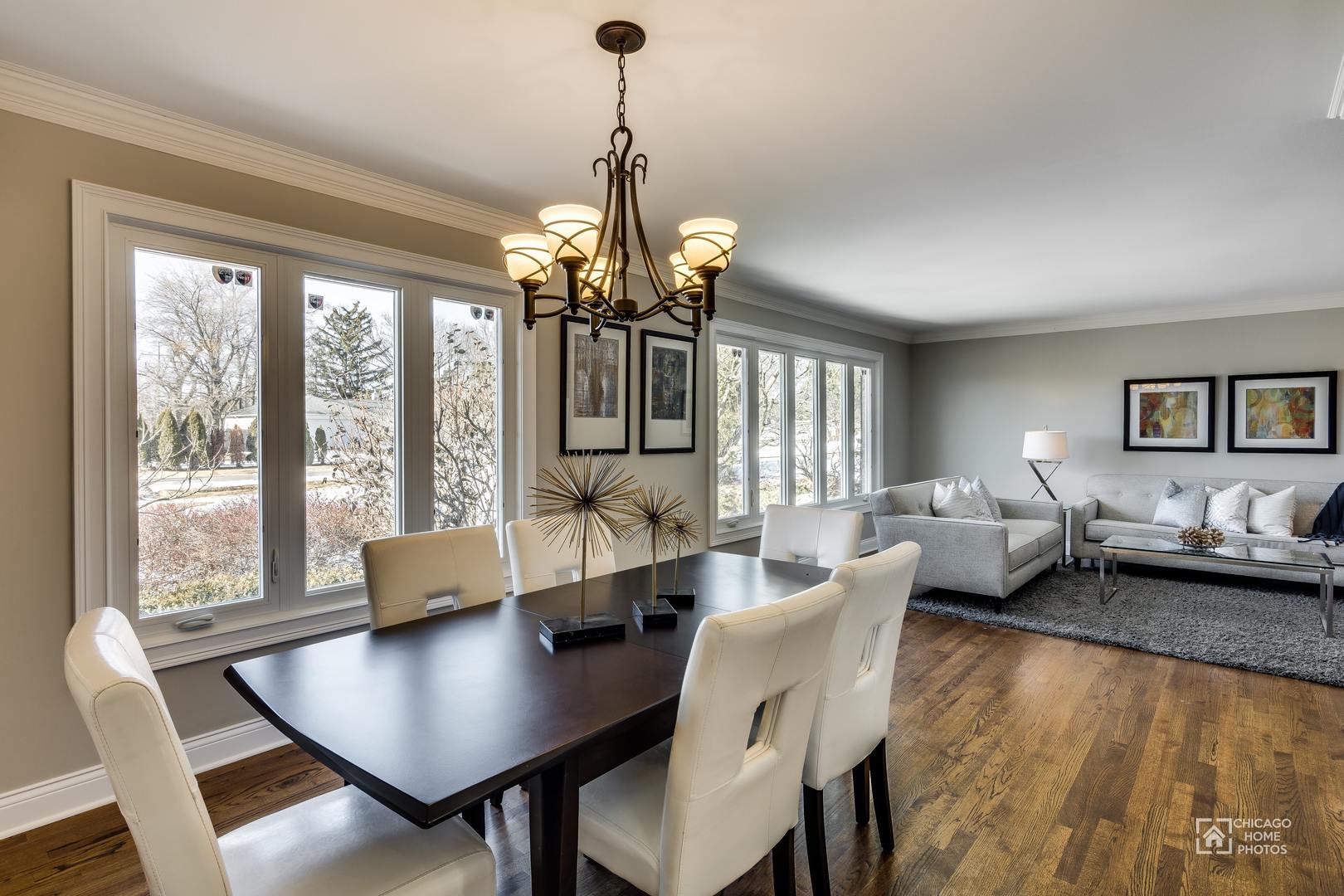 131 Chestnut Road Northbrook, IL 60062 - Photo 5 of 26 a living room with furniture and a chandelier