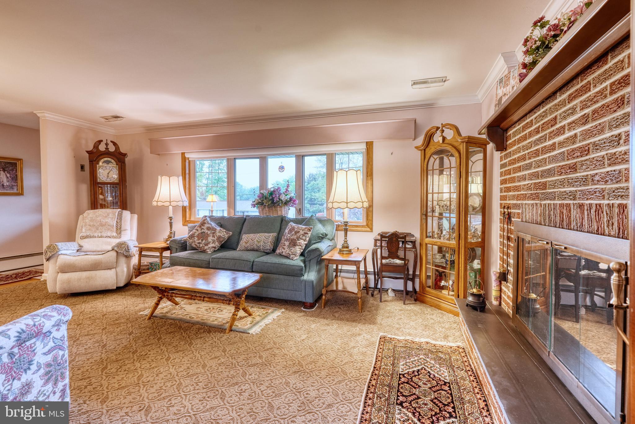135 Holly Road Southampton, PA 18966 - Photo 12 of 52 a living room with furniture and a rug