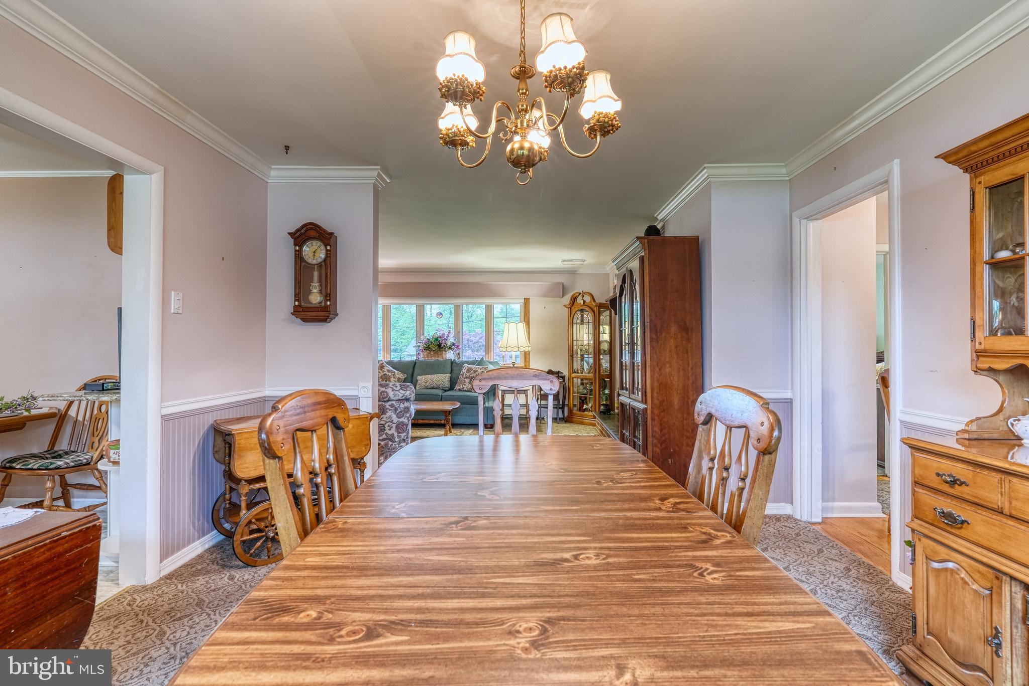 135 Holly Road Southampton, PA 18966 - Photo 15 of 52 a view of a dining room with furniture and chandelier