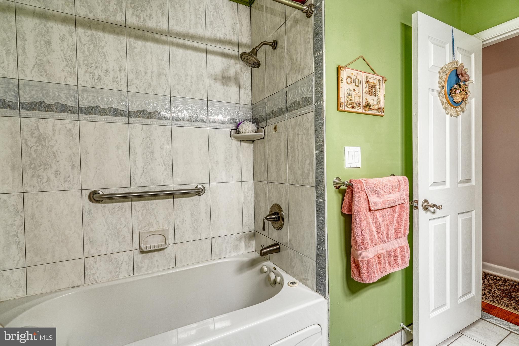 135 Holly Road Southampton, PA 18966 - Photo 22 of 52 a bath room with a bath tub and a shower