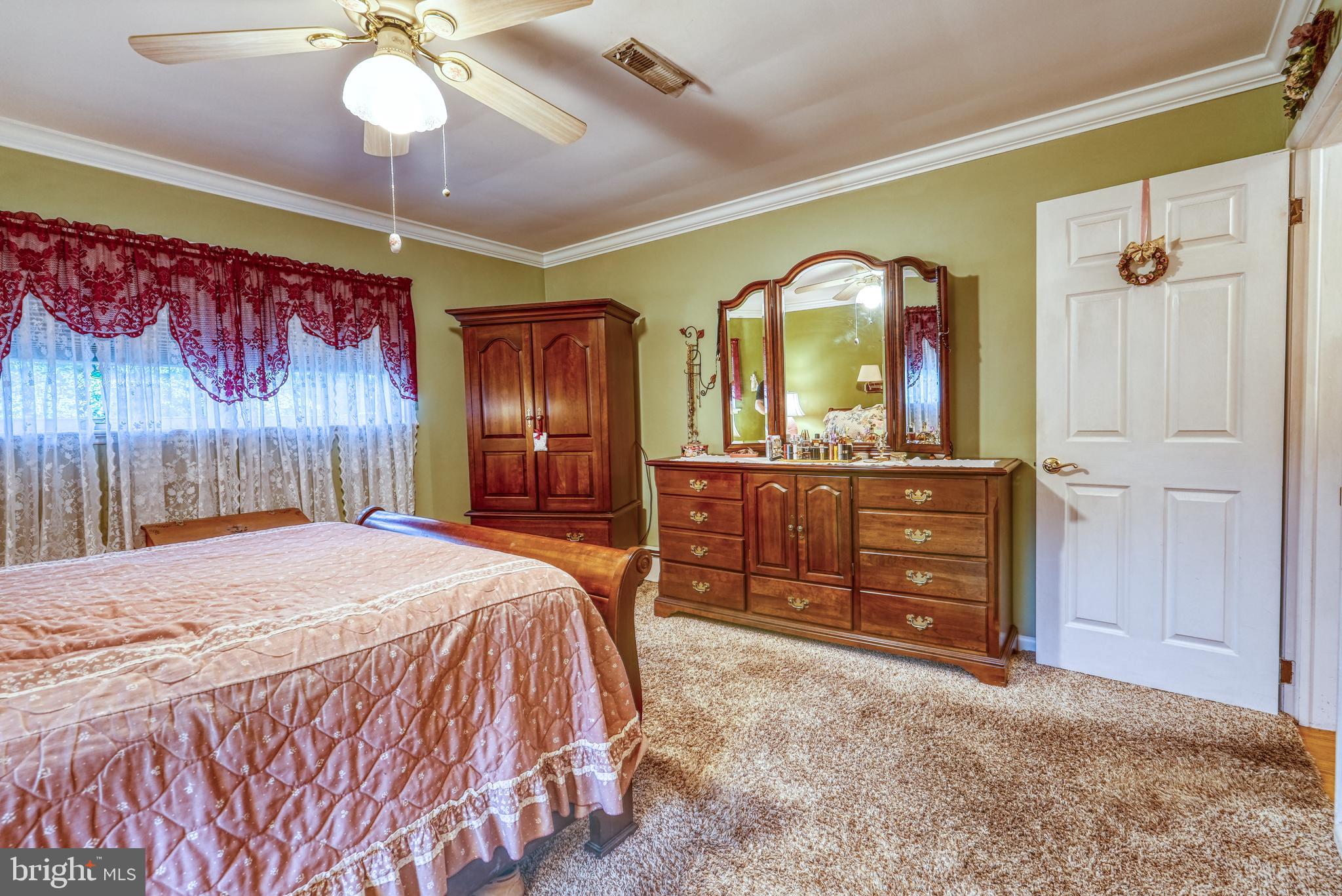 135 Holly Road Southampton, PA 18966 - Photo 24 of 52 a bedroom with a bed and a dresser