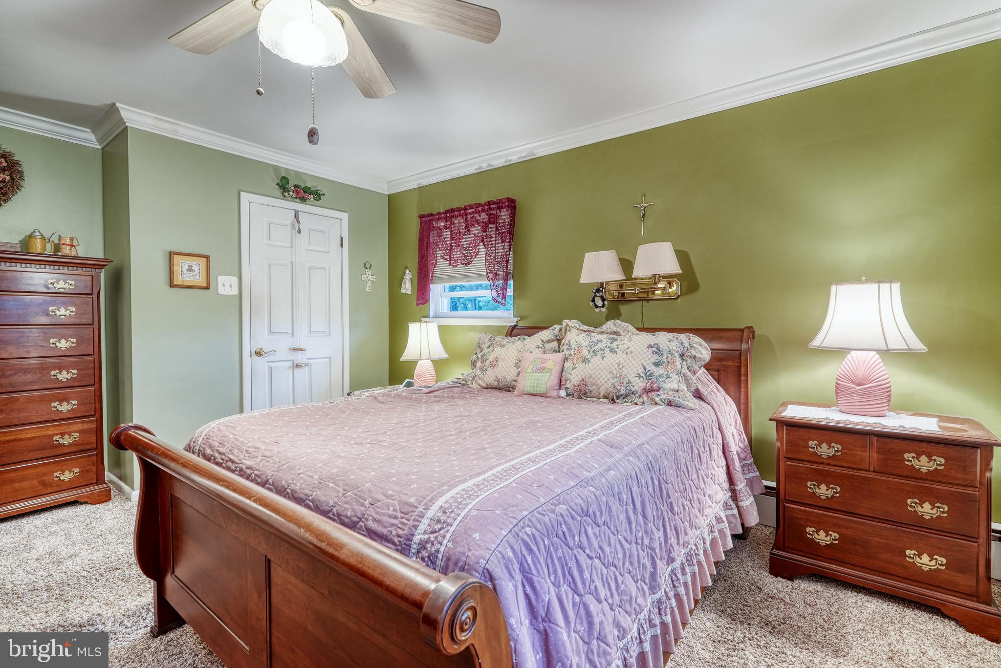 135 Holly Road Southampton, PA 18966 - Photo 25 of 52 a bedroom with a bed and a dresser