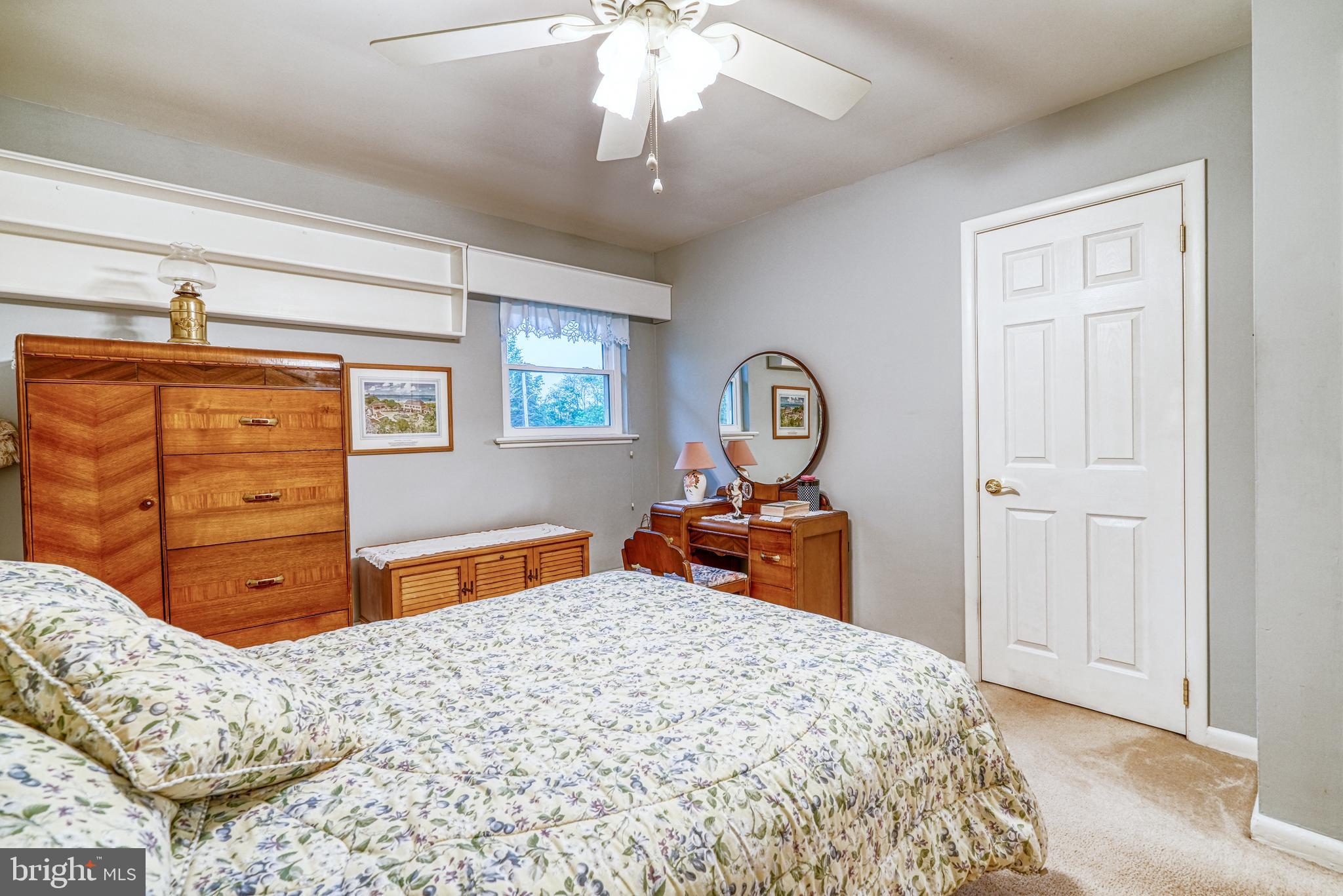 135 Holly Road Southampton, PA 18966 - Photo 27 of 52 a bedroom with a bed and a dresser