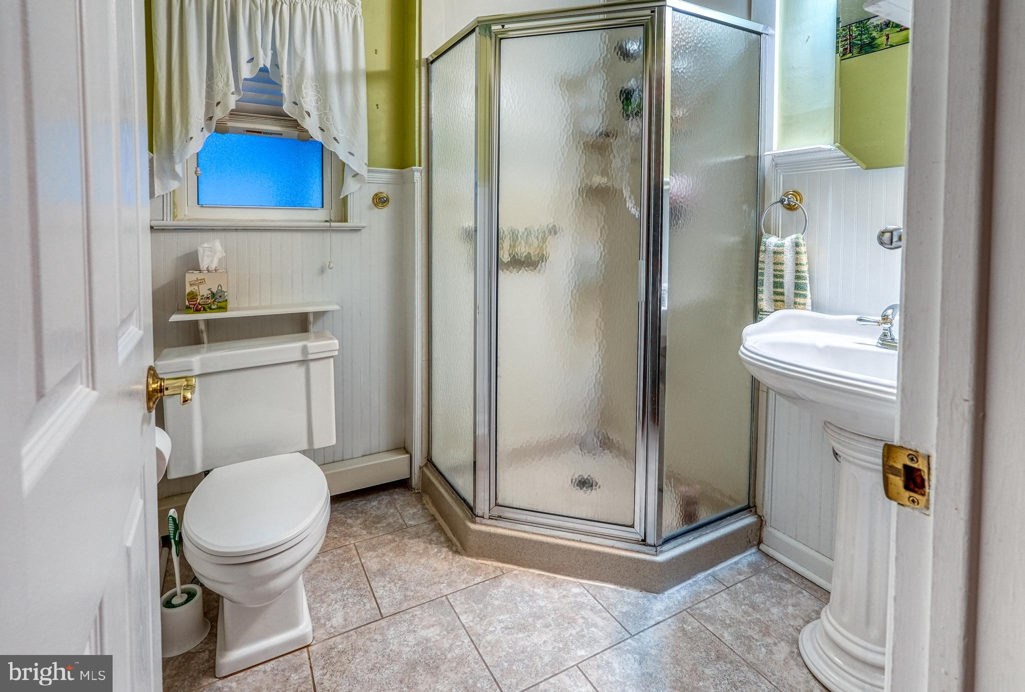 135 Holly Road Southampton, PA 18966 - Photo 28 of 52 a bathroom with a toilet and a shower