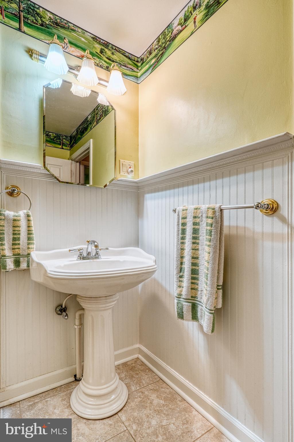 135 Holly Road Southampton, PA 18966 - Photo 30 of 52 a bathroom with a sink and a mirror