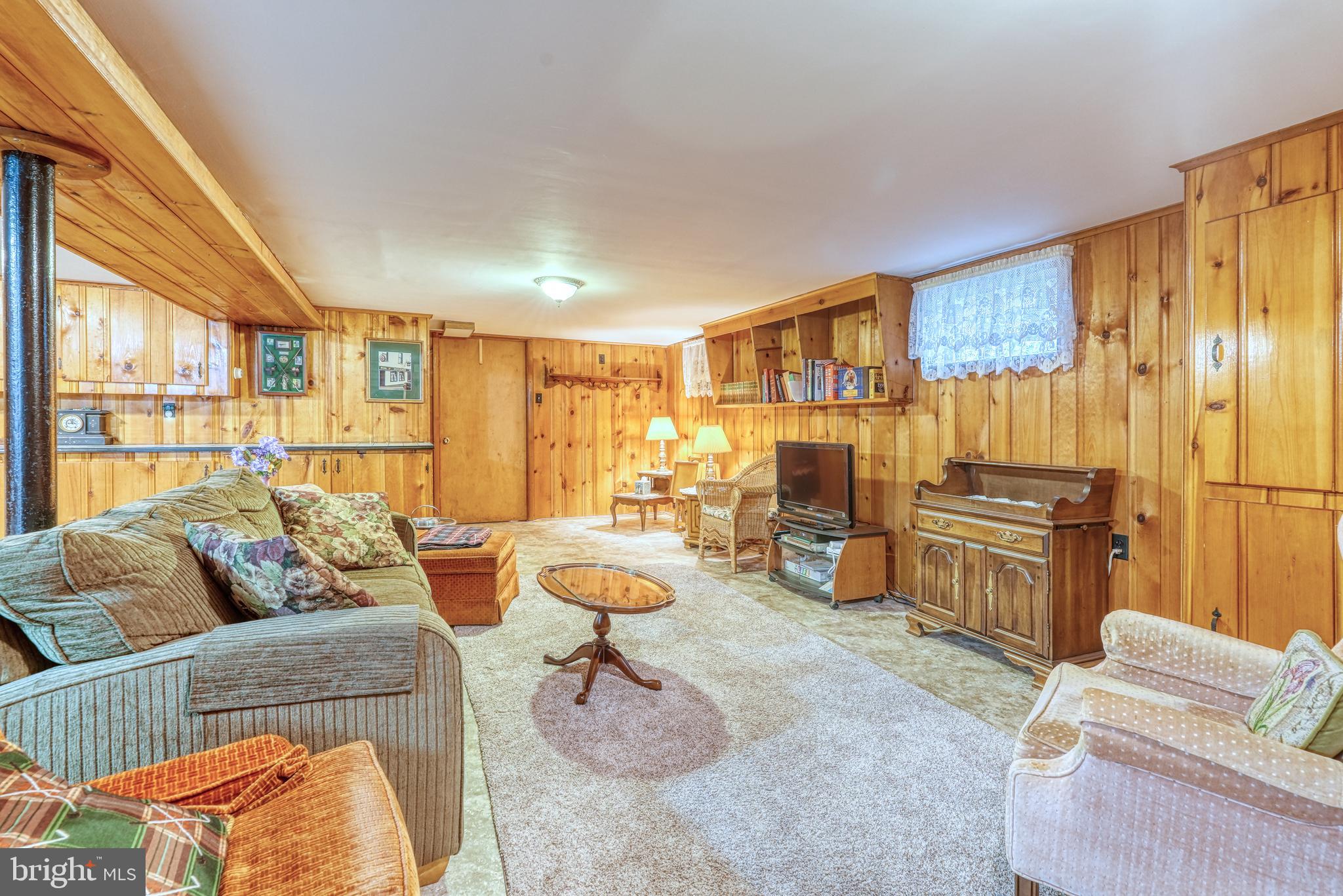 135 Holly Road Southampton, PA 18966 - Photo 39 of 52 a living room with furniture and a fireplace