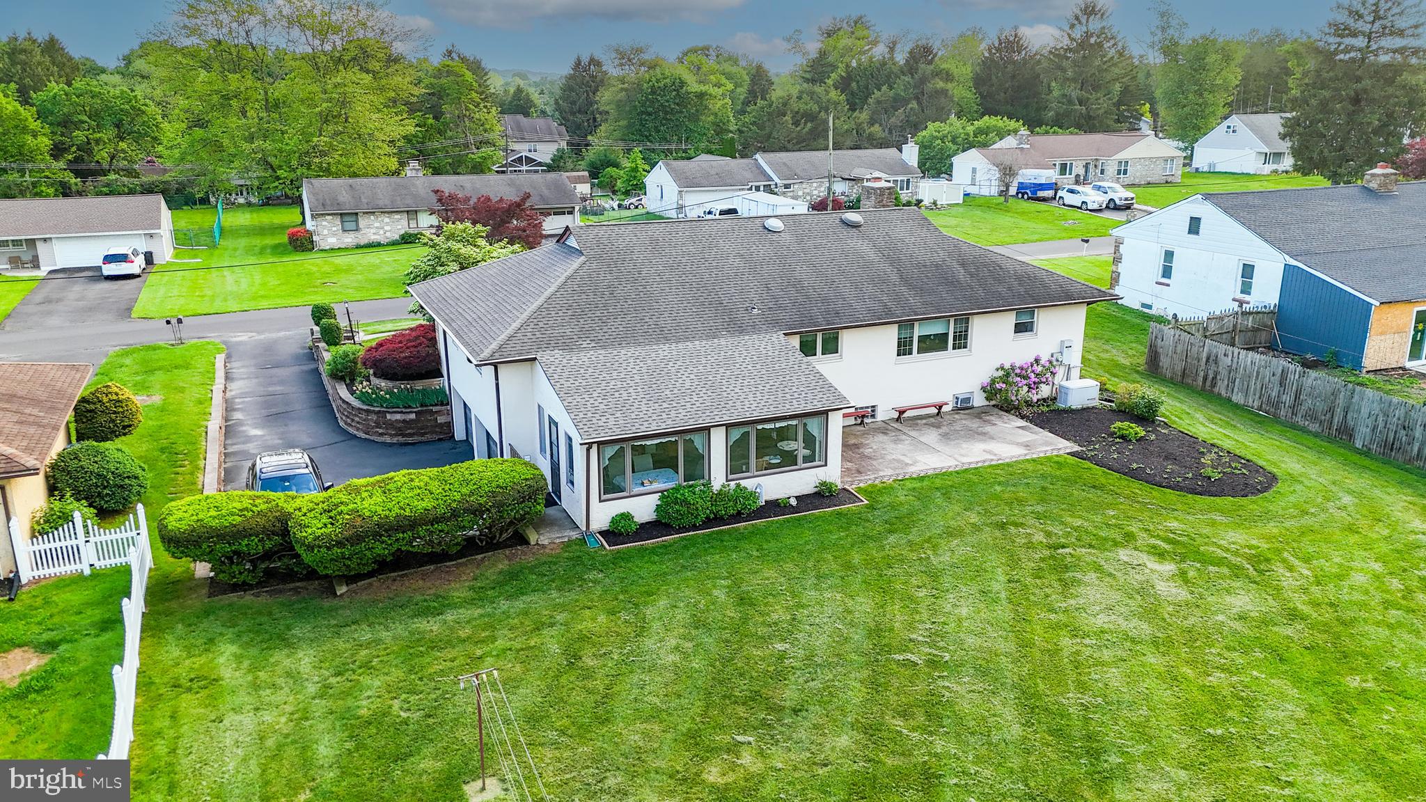 135 Holly Road Southampton, PA 18966 - Photo 5 of 52 an aerial view of a house with swimming pool garden and patio