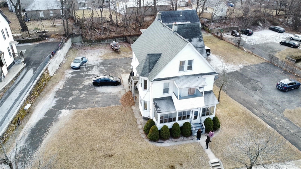 297 Main Street Springfield, MA 01151 - Photo 1 of 26 a view of a street with multiple house