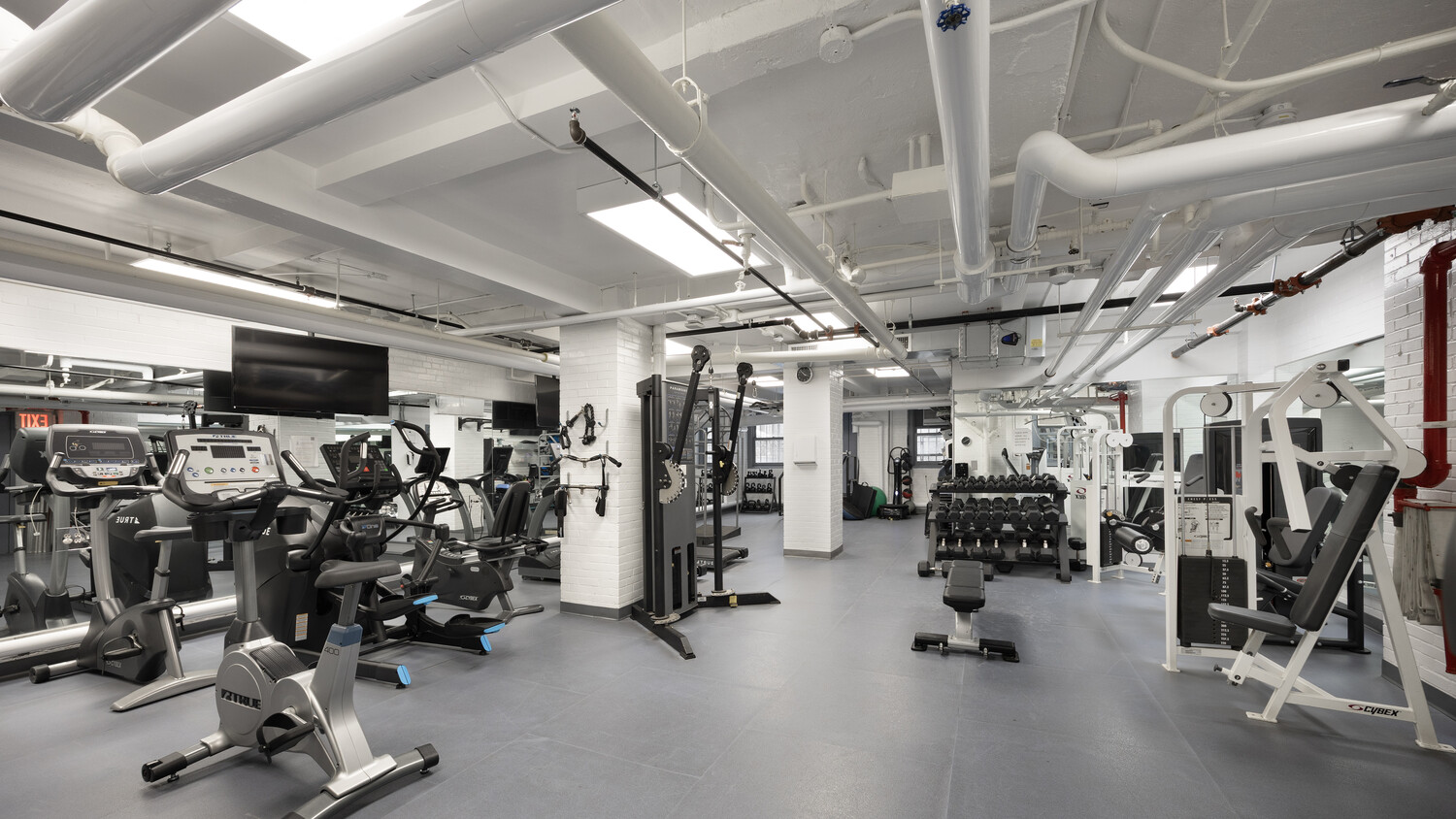 1165 Park Avenue, Unit 10B Manhattan, NY 10128 - Photo 13 of 15 a view of a room with gym equipment