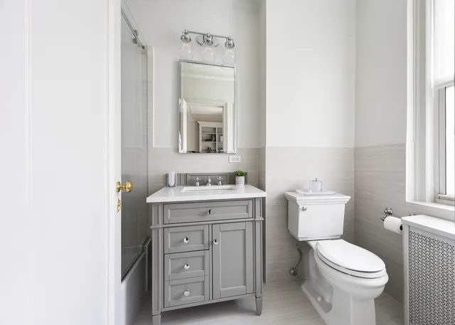 a living room with furniture and window