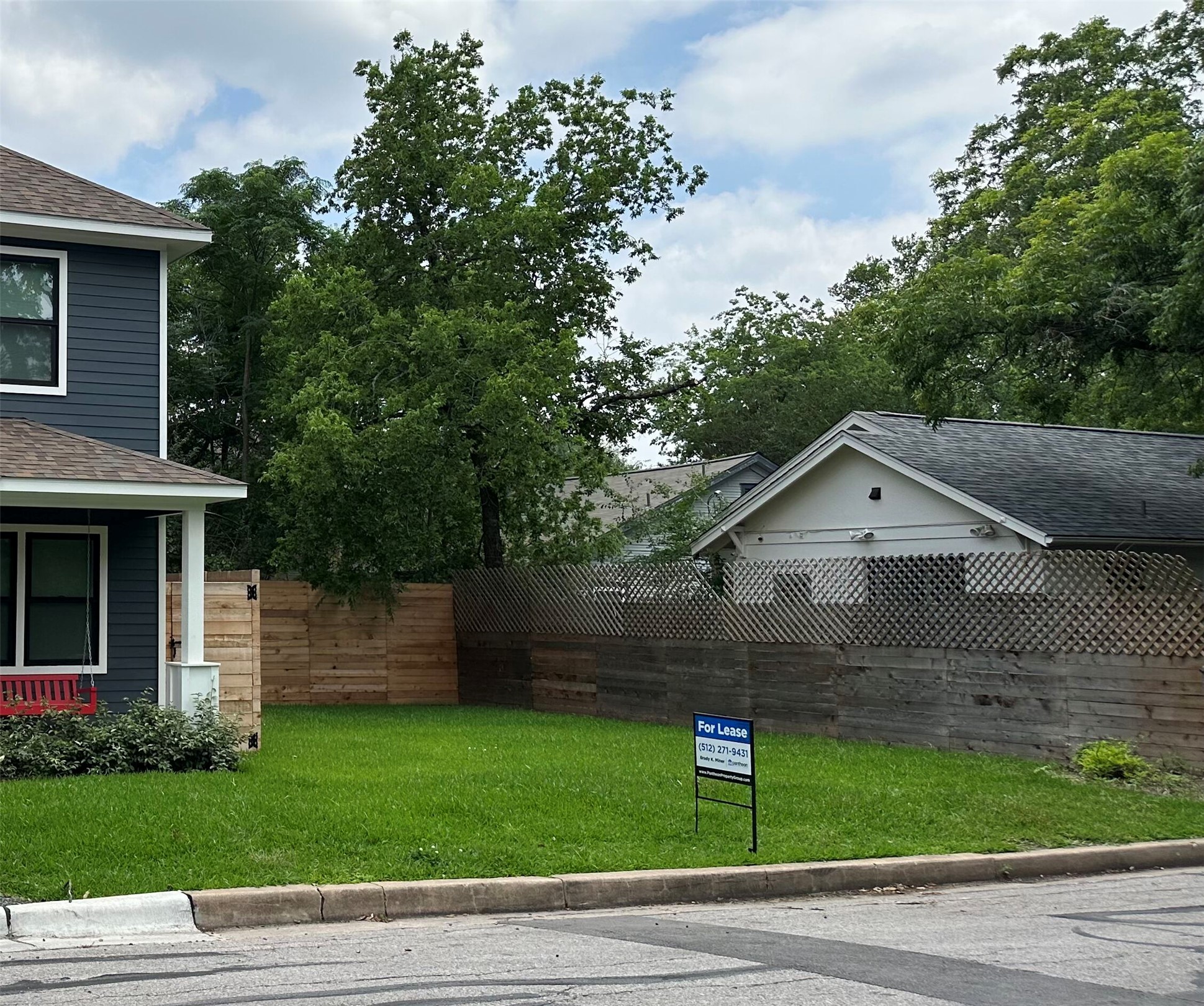 View of yard with covered porch