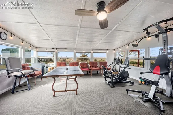 a view of a room with gym equipment