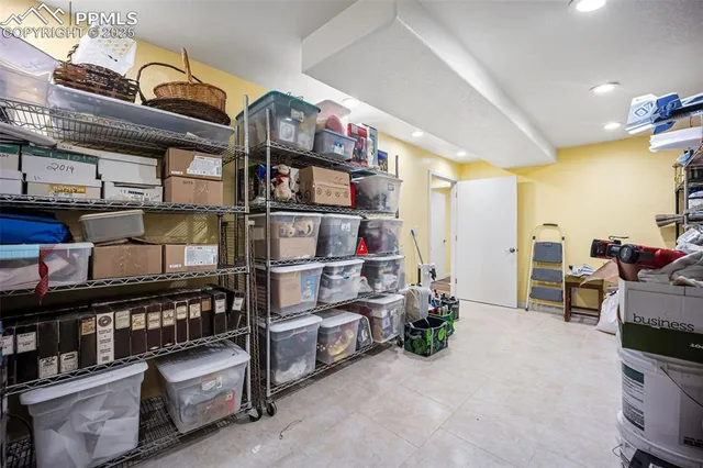 a spacious bedroom with a bed and a window