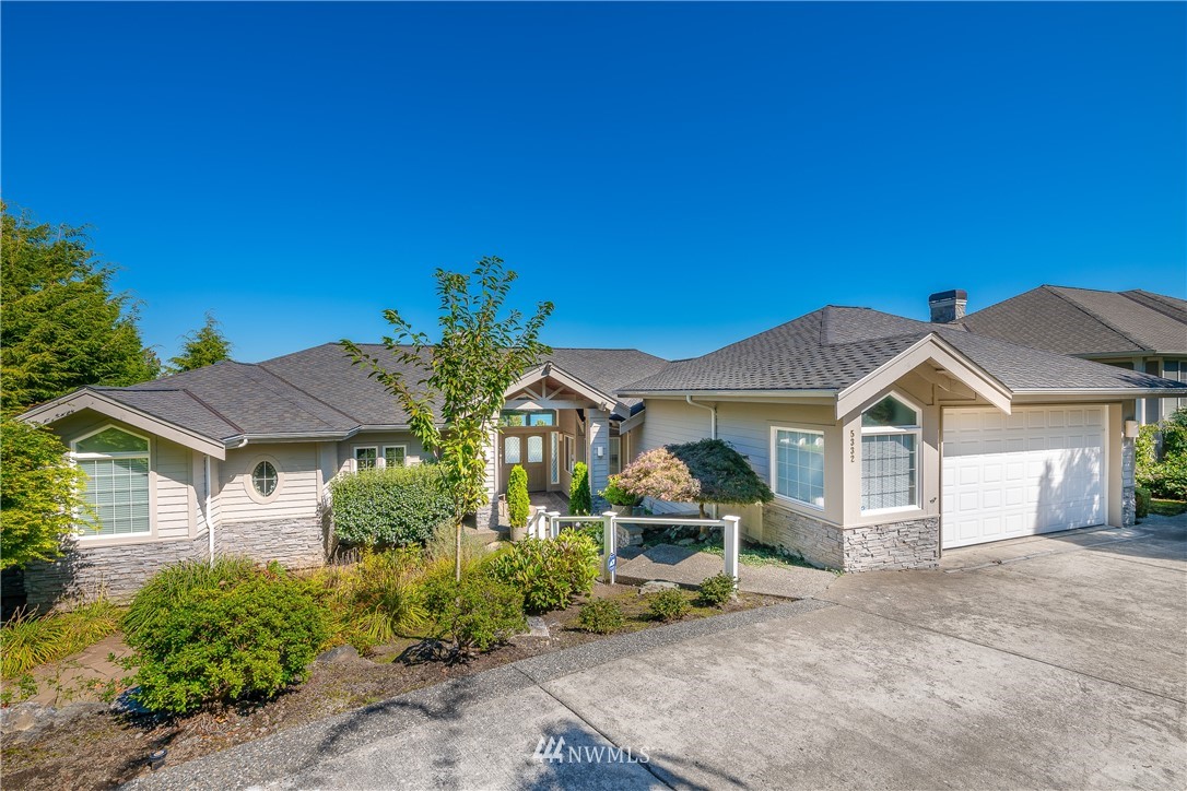 5332 Canvasback Loop Blaine, WA 98230 - Photo 2 of 40 a front view of a house with a garden