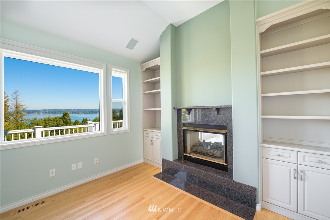 5332 Canvasback Loop Blaine, WA 98230 - Photo 23 of 40 a living room with furniture and a fireplace