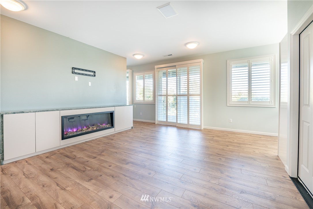 5332 Canvasback Loop Blaine, WA 98230 - Photo 32 of 40 wooden floor in an empty room with a window