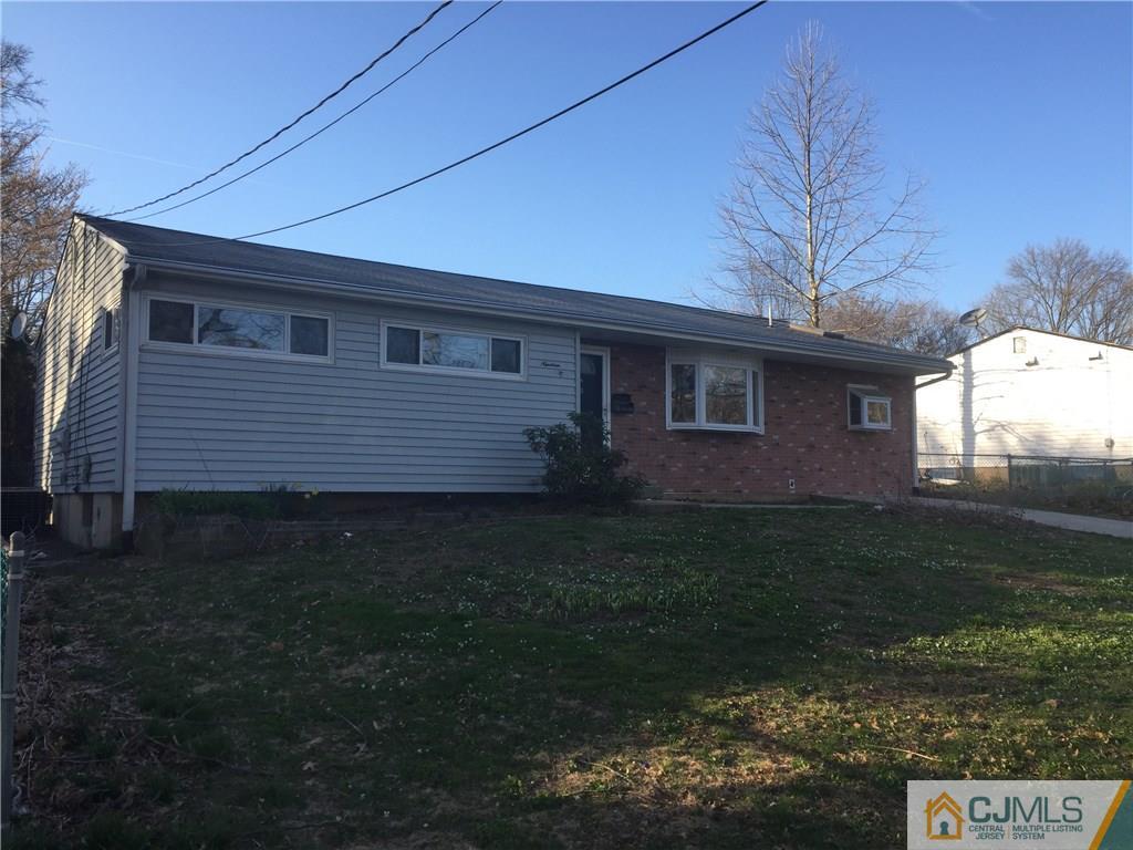 19 Fordham Road Old Bridge, NJ 08859 - Photo 1 of 16 a front view of a house with garden
