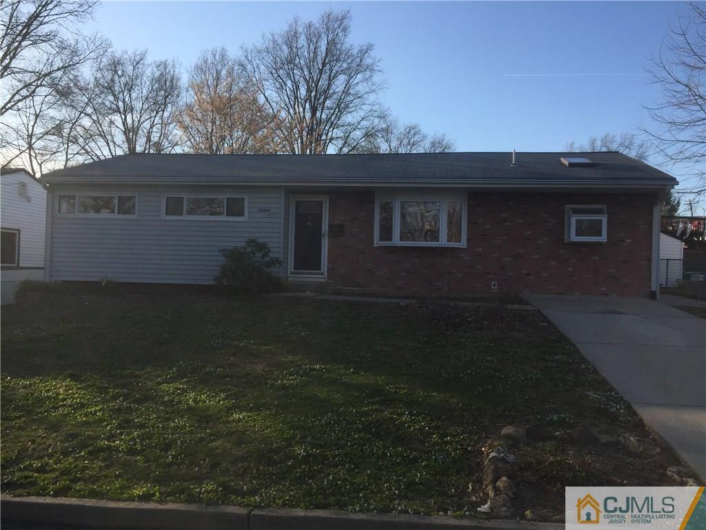 19 Fordham Road Old Bridge, NJ 08859 - Photo 2 of 16 a backyard of a house with lots of green space