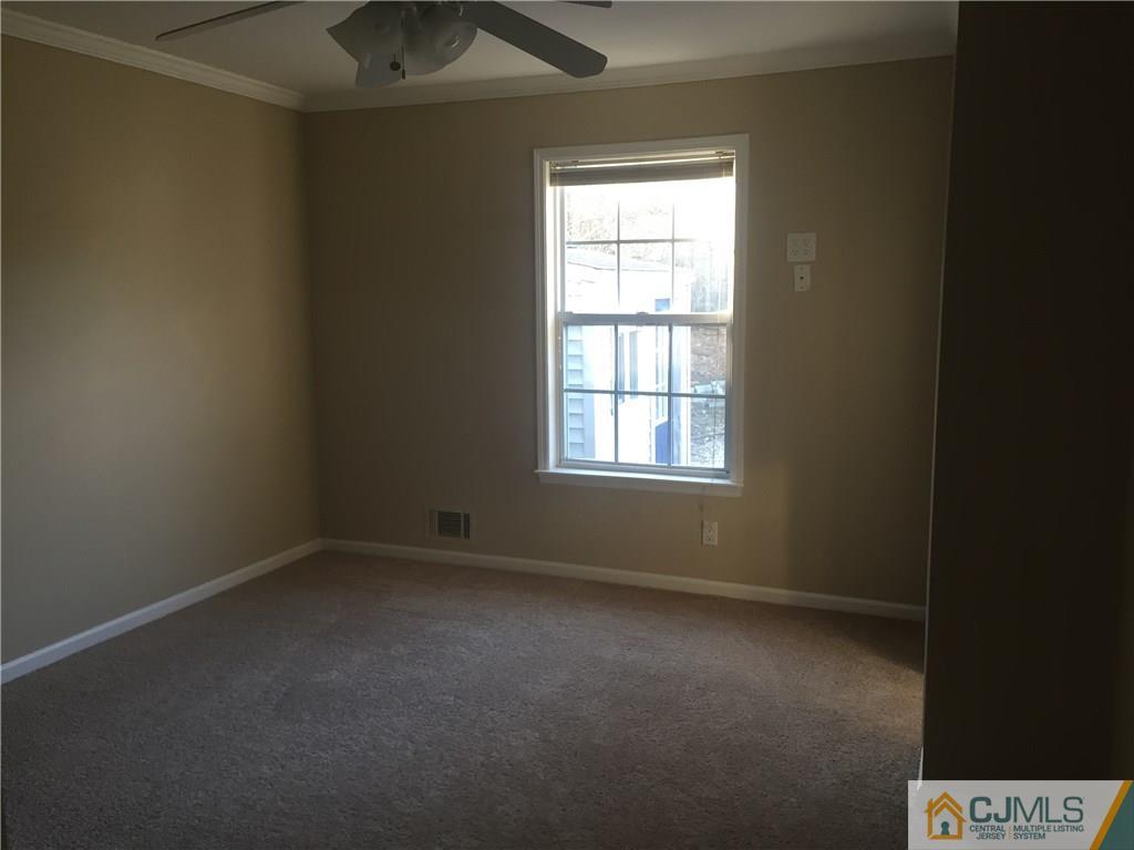 19 Fordham Road Old Bridge, NJ 08859 - Photo 11 of 16 an empty room with a window