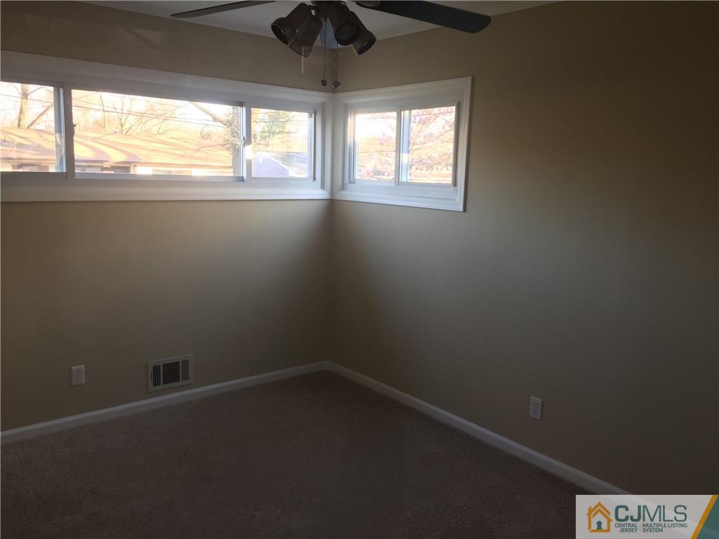 19 Fordham Road Old Bridge, NJ 08859 - Photo 12 of 16 an empty room with a window