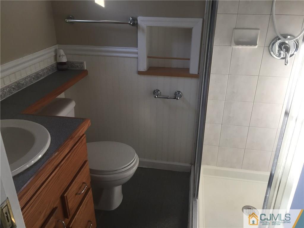 19 Fordham Road Old Bridge, NJ 08859 - Photo 13 of 16 a bathroom with a toilet and a sink