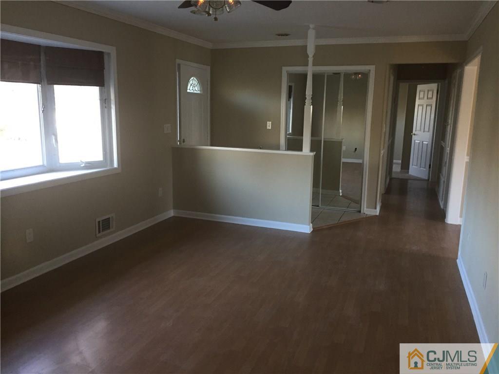 19 Fordham Road Old Bridge, NJ 08859 - Photo 16 of 16 en empty room with windows