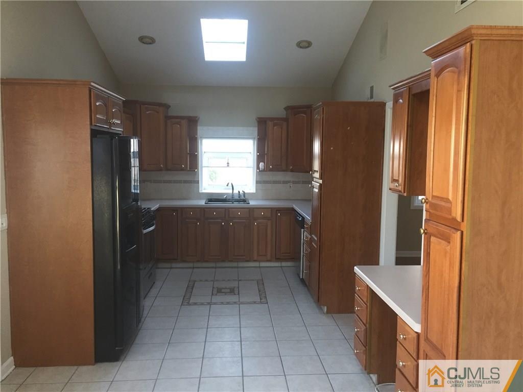 19 Fordham Road Old Bridge, NJ 08859 - Photo 3 of 16 a bathroom with a tub shower and sink