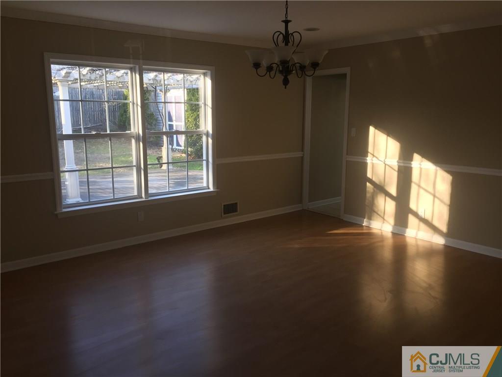 19 Fordham Road Old Bridge, NJ 08859 - Photo 5 of 16 a view of an empty room with a window