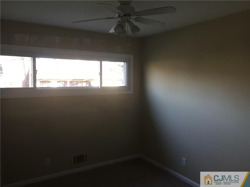 19 Fordham Road Old Bridge, NJ 08859 - Photo 9 of 16 a view of an empty room and window