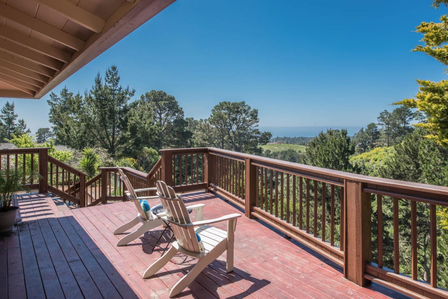 24800 Outlook Drive Carmel, CA 93923 - Photo 15 of 17 a balcony with wooden floor and outdoor seating