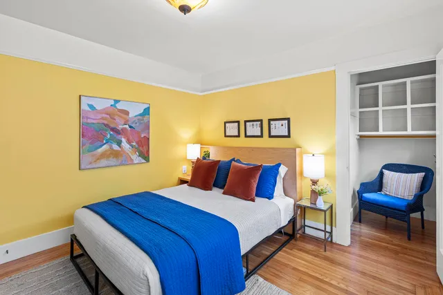 a bathroom with a sink a toilet and shower curtain