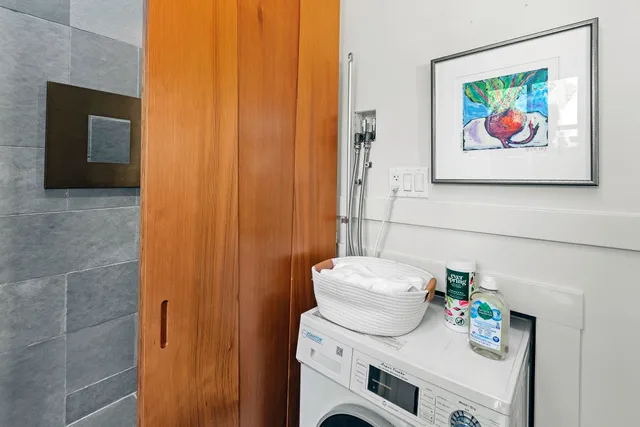 a view of backyard of house with outdoor seating