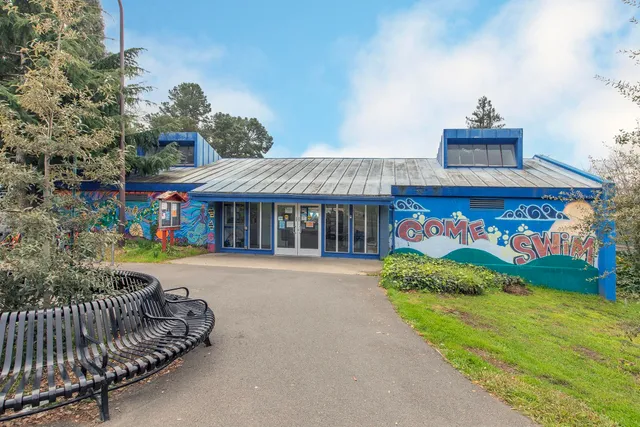 a view of a shop in a street