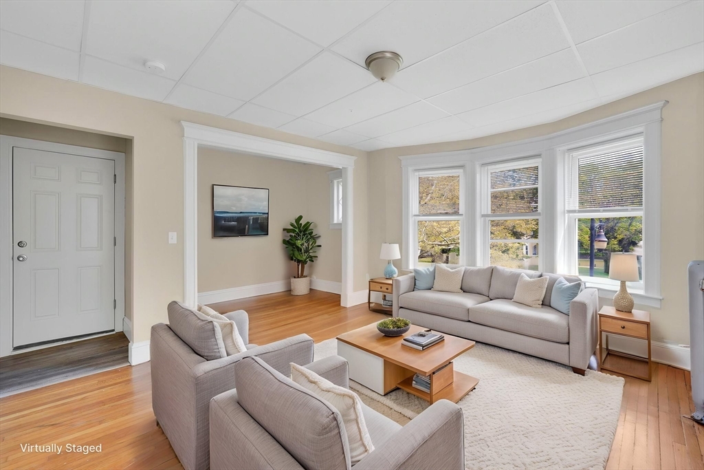242 Fort Pleasant Avenue Springfield, MA 01108 - Photo 27 of 42 a living room with furniture and a large window