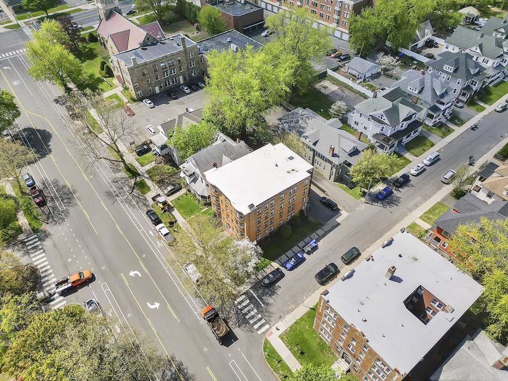 242 Fort Pleasant Avenue Springfield, MA 01108 - Photo 40 of 42 an aerial view of a house with a yard