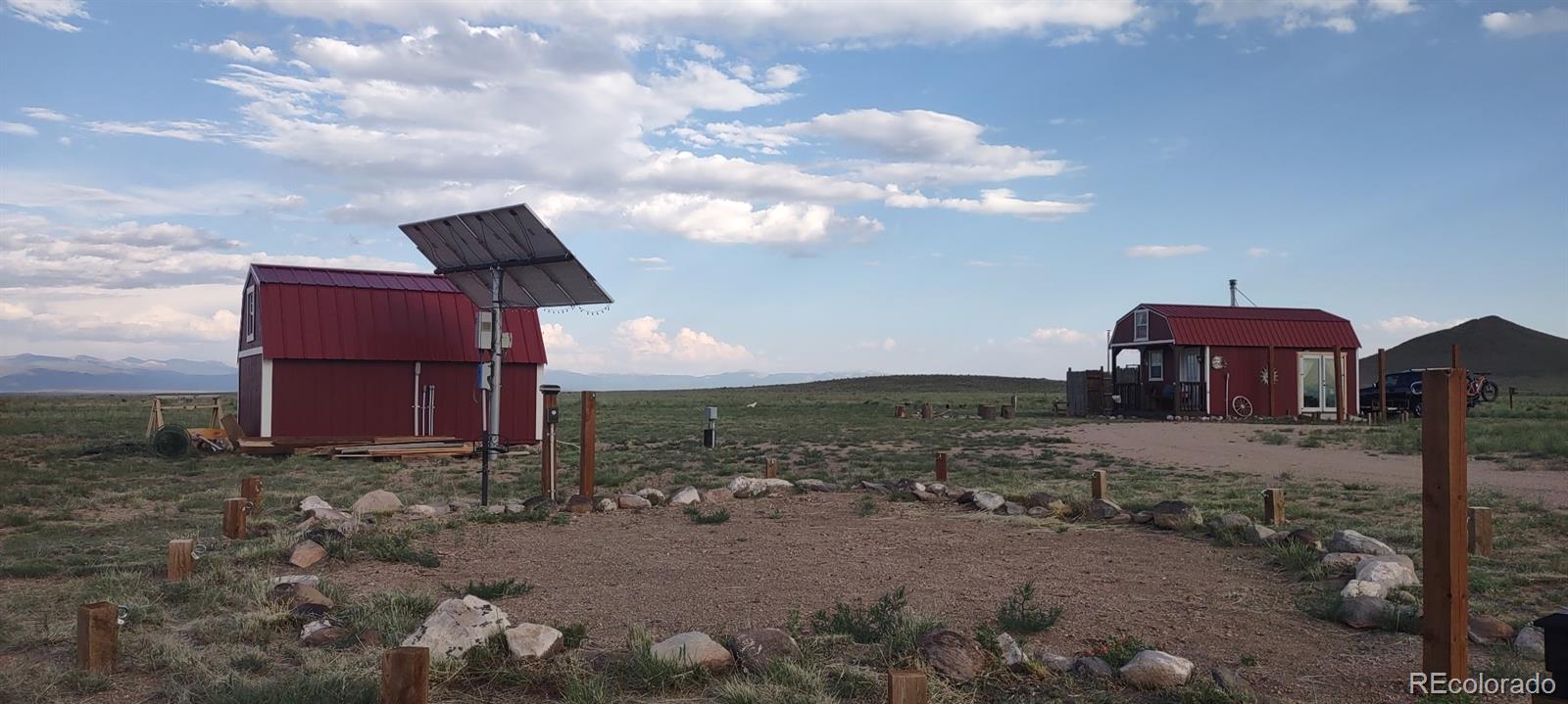 Lot 20 Lajunta Road Blanca, CO 81123 - Photo 3 of 9 a view of a house with a yard