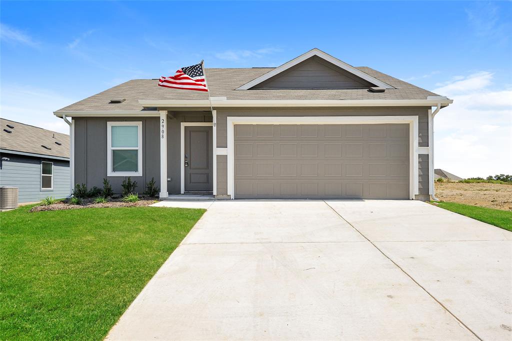 2908 Yellow Pine Avenue Fort Worth, TX 76179 - Photo 1 of 23 a front view of a house with a yard and garage